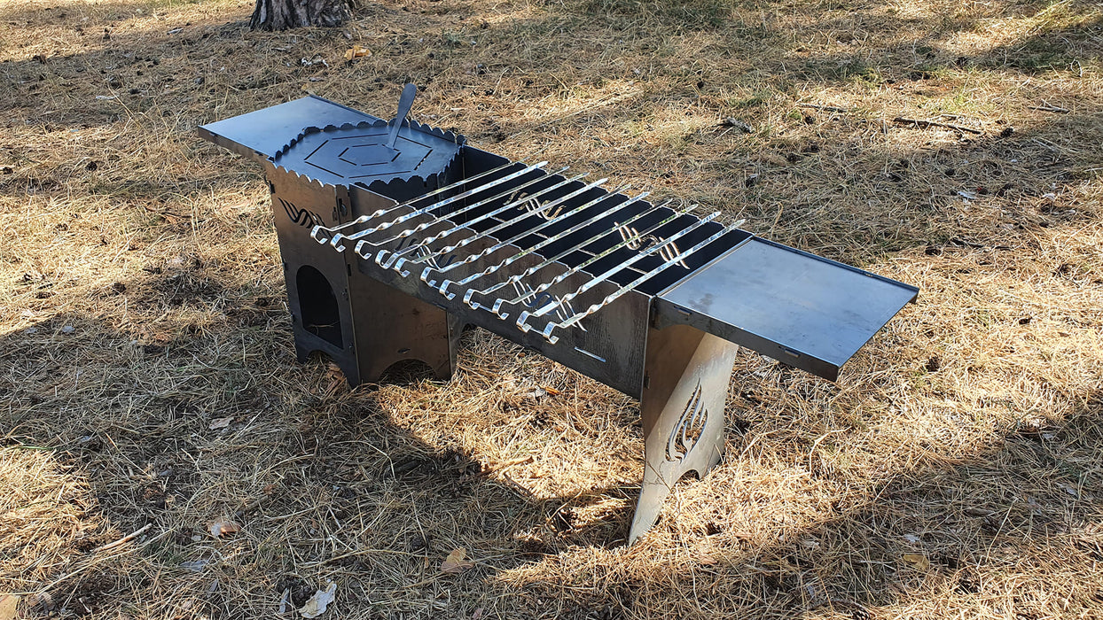 tourist stove with barbecue grill and shelves and skewers, campfire stove